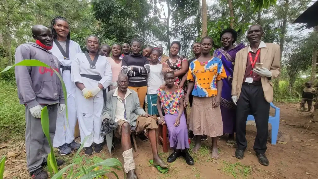 DestinyImpact CBO and Kenya Red Cross volunteers conducting a community fumigation project in Bungoma to improve public health and hygiene.