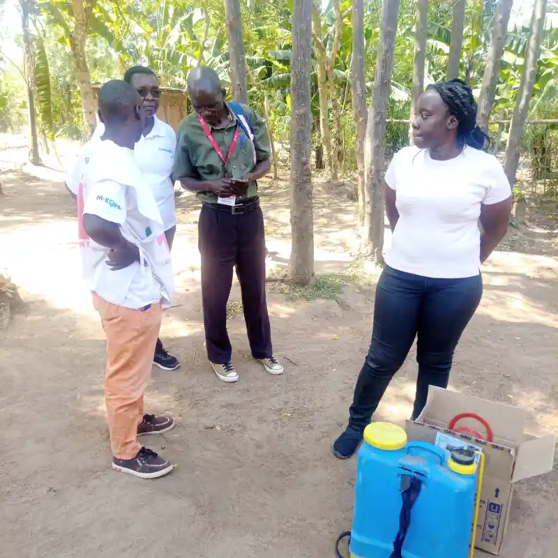 DestinyImpact CBO team members standing with Kenya Red Cross volunteers during a joint anti-jigger campaign in Bungoma County, Kenya.
