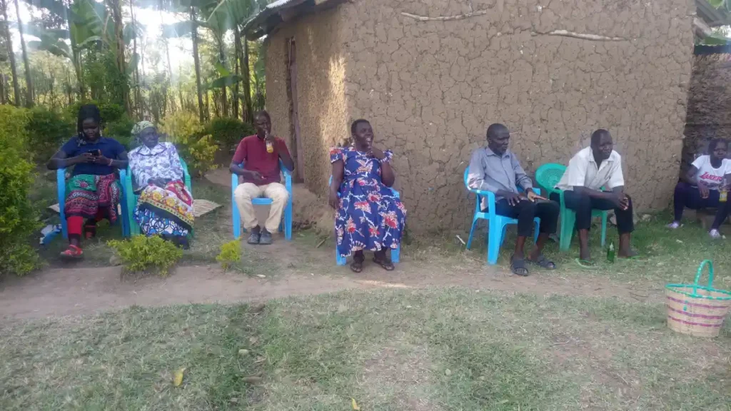 A photo of `Michael's parents at home after his highscool national exams success