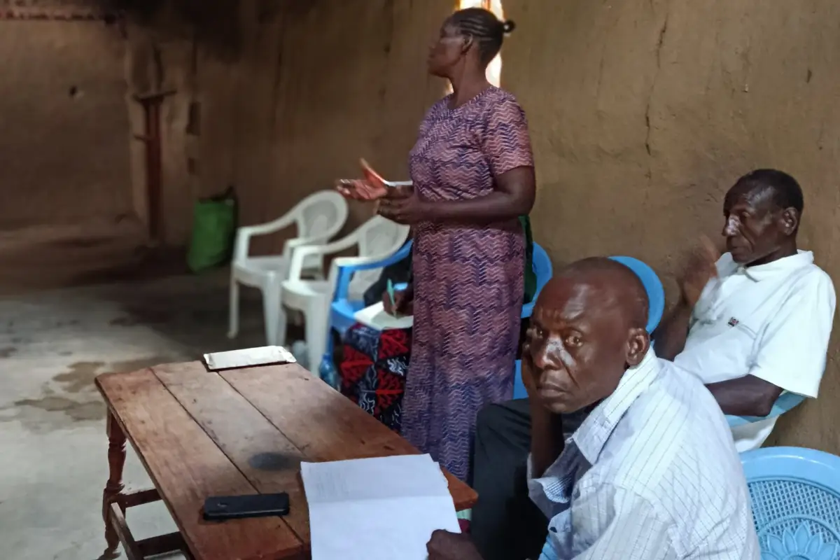 A group member speaks at the disability group meeting at Ng'oli, Bungoma County